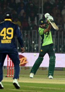 Pakistani batter Babar Azam plays a shot during the second one day international cricket match between Pakistan and Sri Lanka at Pindi Cricket Stadium.