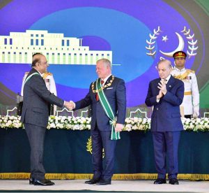 President Asif Ali Zardari shaking hands with His Majesty King Abdullah II ibn Al-Hussein of Jordan after the King conferred the Wisam al-Nahdah al-Mursa‘ award on him at Aiwan-e-Sadr.