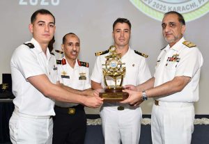 Commander Karachi, Vice Admiral Muhammad Faisal Abbasi awarding Winner's trophy to the team of Turkiye at the closing ceremony of 5th Pakistan Navy International Nautical Competition 2025 held at PNS RAHBAR