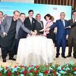 Acting President Syed Yousuf Raza Gilani cutting a cake with dignitaries at a reception celebrating the 5th anniversary of Azerbaijan’s Victory Day