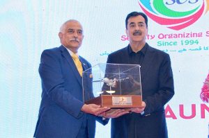 Chief Operating Officer South Air, Air Marshal (Retd) Ijaz Malik presenting souvenir to the Chairman Senate Syed Yousaf Raza Gilani during inauguration ceremony of South Air at a local hotel. APP/TVE/IQJ/ABB