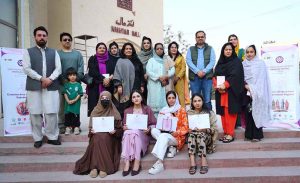 Mayor of Peshawar Zubair Ali and VC SBBWU Prof. Dr. Safia Ahmed (T.I), along with other officials and organizers, visit display stalls during the second day of the Dosti Peshawar Women Literature Festival 3rd Edition at City District College.