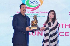 Chief Executive Officer South Air, Nishat Fatima presenting souvenir to the Chairman Senate Syed Yousaf Raza Gilani during inauguration ceremony of South Air at a local hotel
