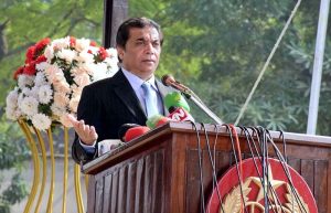 Federal Minister for Railways Muhammad Hanif Abbasi presenting a shield to a policewoman during the passing-out parade of 468 personnel at the Railway Police Training School, Walton