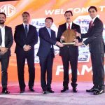 CEO of MG Motors presenting a souvenir to Acting President Syed Yousaf Raza Gilani at the inaugural ceremony of MG's flagship dealership
