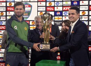 Pakistan’s Captain Shaheen Shah Afridi receives the trophy from Defence Minister Khawaja Muhammad Asif after the ODI series victory over Sri Lanka.