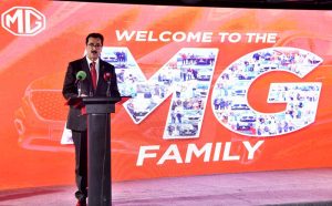 CEO of MG Motors presenting a souvenir to Acting President Syed Yousaf Raza Gilani at the inaugural ceremony of MG's flagship dealership