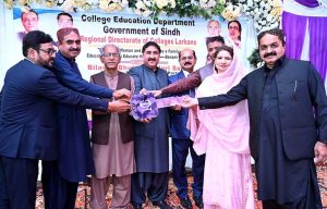 Special Assistant to Chief Minister Sindh Khair Muhammad Sheikh along with others inaugurates the new buses for different colleges of district to improve the travel facilities of students during the ceremony at Shaheed Mohtarma Benazir Bhutto Government Girls Degree College Naudero.
