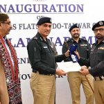 Inspector General of Sindh Police, Ghulam Nabi Memon handing over the official residential units among officers and personnel during a ceremony organized by Sindh Police for the allotment of flats/apartments to Sindh Police officers and personnel at Police Headquarters Garden South and Clifton.