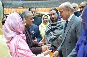 Prime Minister Muhammad Shehbaz Sharif interacts with the members of the National Assembly