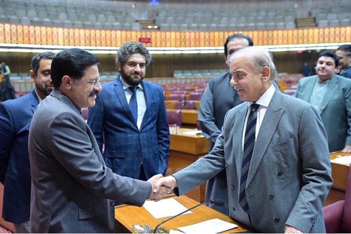 Prime Minister Muhammad Shehbaz Sharif interacts with the members of the National Assembly