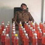 12 suspects held; 2.35kg heroin, liquor & illegal arms seized
