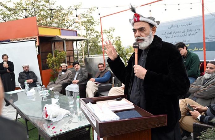 Senator Talha Mahmood addresses a ceremony for the book launch of Qazi Inayat Jalil Anbar, a prominent Khowar literature writer, poet, and radio host, on the publication of his new book “Sada Bahar Khowar Geet” (Volume I)