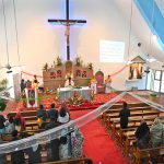 Christian community members performing religious rituals on Christmas day at Fatima Church.