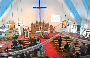 Christian community members performing religious rituals on Christmas day at Fatima Church.