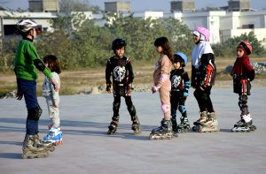 Children enjoy skating on the New Road 47.