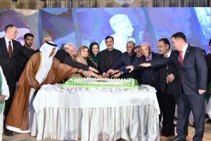 Chairman Senate Syed Yousuf Raza Gilani cutting the cake along with other dignitaries at an event held at Aiwan-e-Sadr on the 149th birth anniversary of Quaid-i-Azam Muhammad Ali Jinnah.