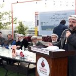 Qazi Inayat Jalil Anbar, a prominent Khowar literature writer, poet, and radio host, addresses a ceremony for the launch of his new book “Sada Bahar Khowar Geet” (Volume I)