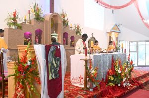 Christian community members performing religious rituals on Christmas day at Fatima Church.