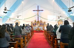 Christian community members performing religious rituals on Christmas day at Fatima Church.