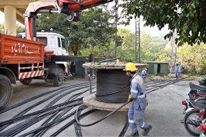 IESCO workers busy installing new electric wires in Federal Capital
