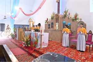Christian community members performing religious rituals on Christmas day at Fatima Church.
