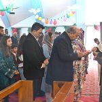 Christian community members performing religious rituals on Christmas day at Fatima Church.