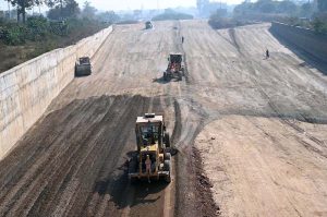 Machinery being used in construction work of 10th Avenue during development work in Federal Capital