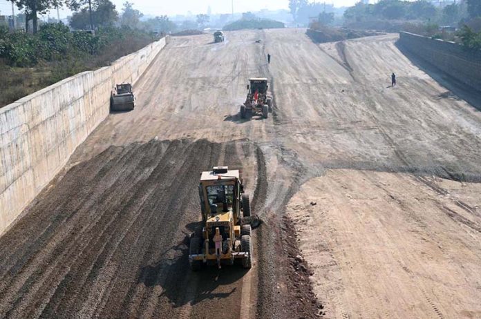 Machinery being used in construction work of 10th Avenue during development work in Federal Capital