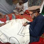Artisans make and display their handmade decorative items at a stall during the second day of the Pakistan–Tajikistan Culture Festival Week at Lok Virsa.