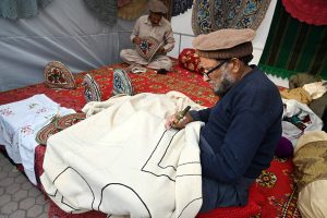 Artisans make and display their handmade decorative items at a stall during the second day of the Pakistan–Tajikistan Culture Festival Week at Lok Virsa.