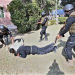 Security personnel are performing a mock exercise to prepare for any untoward incident at the University of Sargodha.
