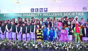 Minister of State for Federal Education and Professional Training, Ms. Wajiha Qamar, Parliamentary Secretary for the Ministry of Federal Education and Professional Training, Ms. Farah Naz Akbar and Federal Secretary Ministry of FE&PT Nadeem Mahbub pose for photograph with special children during a seminar on International Day of Persons with Disabilities 2025, Theme:"Fostering Disability-Inclusive Societies for Advancing Social Progress" at Rehabilitation Centre for Children with Developmental Disorders (RCCDD)