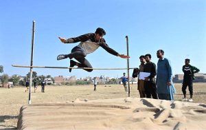 Player is participates in high jump competition during Inter-Collegiate Athletics Competition organized by Sports Department of Education Board held at Education Board Ground.