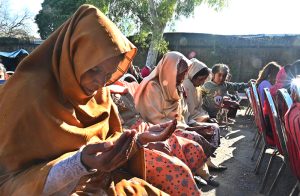 Christian community members performing religious rituals on Christmas day at Fatima Church.