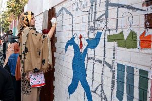 Students of Government graduate college for Women participating in wall painting competition during international anti-corruption day organized by the National accountability Bureau (NAB).