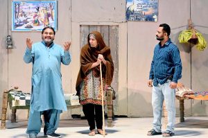 Artists perform in the drama “Maa (Mother)” during the Drama Festival at the Z.A. Bhutto Open Air Theatre, Arts Council.