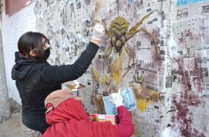 Students of Government graduate college for Women participating in wall painting competition during international anti-corruption day organized by the National accountability Bureau (NAB).