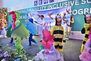 Minister of State for Federal Education and Professional Training, Ms. Wajiha Qamar, Parliamentary Secretary for the Ministry of Federal Education and Professional Training, Ms. Farah Naz Akbar and Federal Secretary Ministry of FE&PT Nadeem Mahbub pose for photograph with special children during a seminar on International Day of Persons with Disabilities 2025, Theme:"Fostering Disability-Inclusive Societies for Advancing Social Progress" at Rehabilitation Centre for Children with Developmental Disorders (RCCDD)