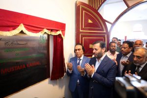 Federal Minister for National Health Services Regulation and Coordination Syed Mustafa Kamal cutting ribbon to inaugurate Indus University North Karachi Campus.