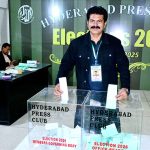 A journalist casts his vote during Election-2026 Hyderabad Press Club.