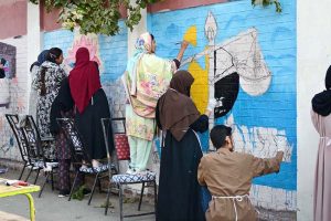 Students of Government graduate college for Women participating in wall painting competition during international anti-corruption day organized by the National accountability Bureau (NAB).