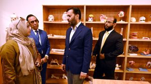 Federal Minister for National Health Services Regulation and Coordination Syed Mustafa Kamal cutting ribbon to inaugurate Indus University North Karachi Campus.