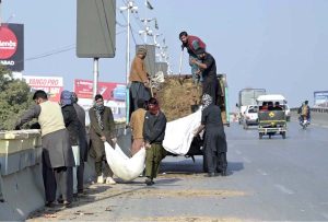 CDA gardeners are refilling fertile soil in plant pots planted along the bridge as part of the ongoing beautification efforts in twin cities.