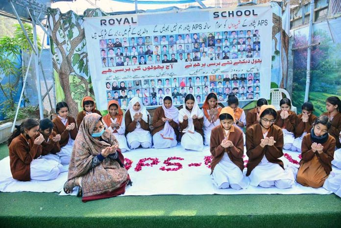 Students offering dua in commemoration of the martyrs of the 2014 Army Public School Peshawar terrorist attack at the Royal School System