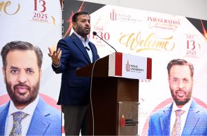 Federal Minister for National Health Services Regulation and Coordination Syed Mustafa Kamal cutting ribbon to inaugurate Indus University North Karachi Campus.