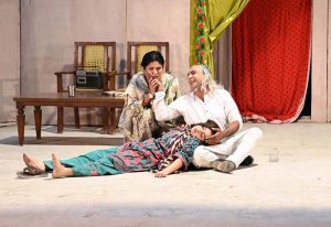 Artists performing in the Sindhi drama "Lag Manhanja Loh" during Drama Festival at Z.A. Bhutto Open Air Theater, Arts Council