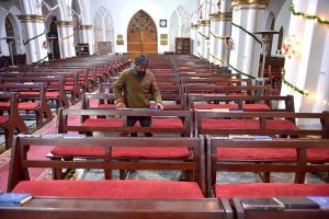 An illuminated view of St. John’s Church decorated with colourful lights in preparation for Christmas celebrations.