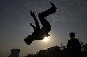 Youngsters leap and play with energy, creating striking silhouettes during the afternoon at G-6 in the Federal Capital