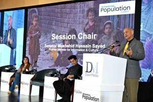 Senator Mushahid Hussain Syed addresses a conference on population issues organized by Dawn Media at a local hotel.